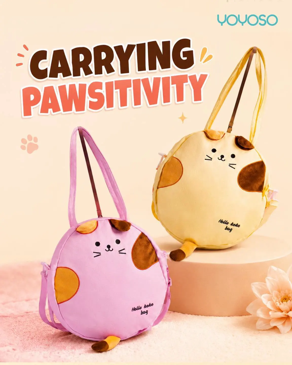 Cat face tote bags photographed on peach with the line carrying pawsitivity