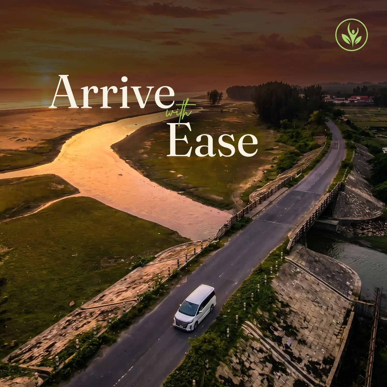 Aerial shot of a car on a road beside a river with the line arrive with ease